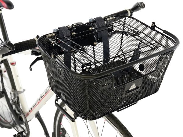 An expanded metal basket is installed on the bicycle.