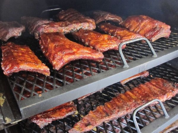 Many meat loafs are cooked over the grill tray.