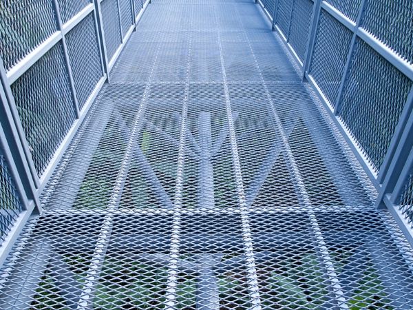 Expanded metal walkway built over the overpass.